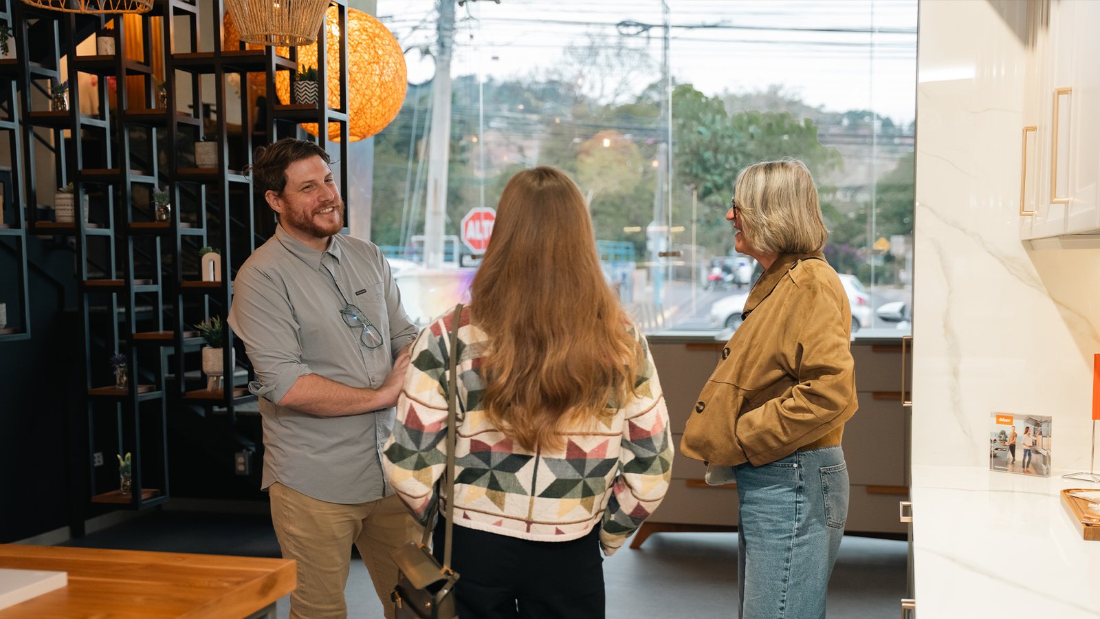 Visitors exploring custom kitchen designs at Mobilinea showroom